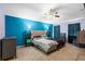 Spacious bedroom with a plush bed, large window and ceiling fan at 2102 Deltona Blvd, Spring Hill, FL 34606