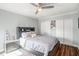 Spacious bedroom with built-in shelving and double doors at 2424 W Tampa Bay Blvd # D203, Tampa, FL 33607