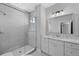Modern bathroom with single vanity and walk-in shower at 3612 W Renellie Cir, Tampa, FL 33629