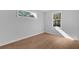Bright bedroom with hardwood floors and neutral walls at 3612 W Renellie Cir, Tampa, FL 33629