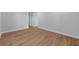 Bright bedroom with hardwood floors and neutral walls at 3612 W Renellie Cir, Tampa, FL 33629