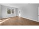 Spacious bedroom with hardwood floors and ensuite bathroom at 3612 W Renellie Cir, Tampa, FL 33629