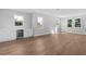 Spacious living room with hardwood floors and lots of natural light at 3612 W Renellie Cir, Tampa, FL 33629