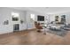 Inviting living room with wet bar, beverage cooler, and ample natural light at 3612 W Renellie Cir, Tampa, FL 33629