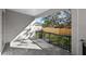 Covered patio with brick flooring and backyard view at 3612 W Renellie Cir, Tampa, FL 33629