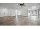Spacious living area featuring vinyl plank flooring and ceiling fan at 4175 103Rd N Ave, Clearwater, FL 33762