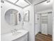 Clean bathroom with large vanity and mirror at 4175 103Rd N Ave, Clearwater, FL 33762