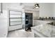 Modern kitchen with white cabinets and new appliances at 4175 103Rd N Ave, Clearwater, FL 33762