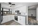 Modern kitchen with white cabinets and new appliances at 4175 103Rd N Ave, Clearwater, FL 33762