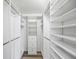 Large walk-in closet with ample shelving and hanging space at 4175 103Rd N Ave, Clearwater, FL 33762