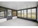 Bright screened porch with backyard view at 4175 103Rd N Ave, Clearwater, FL 33762