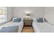 Bedroom with two twin beds at 5026 Coquina Key Se Dr # 5026, St Petersburg, FL 33705