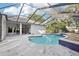 Enjoy this refreshing pool with a screened enclosure at 6411 Barton Rd, Plant City, FL 33565