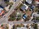 Aerial view of property shows lot lines, nearby homes and neighborhood streets at 7060 Boca Ciega Dr, St Pete Beach, FL 33706