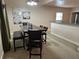 Dining area with a wooden table and seating for six at 790 7Th Ne Ave, Largo, FL 33770