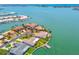 Beautiful aerial of waterfront homes with private docks and neighborhood layout at 11683 Grove St, Seminole, FL 33772