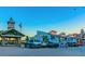 Charming boardwalk entrance with shops and parking, a popular tourist destination at 11683 Grove St, Seminole, FL 33772