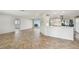 Bright living room with tile floors and view of the canal at 11683 Grove St, Seminole, FL 33772