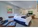 Modern bedroom with a king-size bed and Eames Lounge Chair at 1560 53Rd N St, St Petersburg, FL 33710