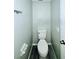Small half bathroom with toilet and sink at 1960 Union St # 25, Clearwater, FL 33763