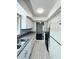 Updated kitchen with granite countertops and white cabinets at 1960 Union St # 25, Clearwater, FL 33763