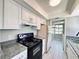 Kitchen features granite countertops and updated appliances at 1960 Union St # 25, Clearwater, FL 33763