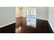 Living room with hardwood floors and sliding glass doors at 1960 Union St # 25, Clearwater, FL 33763