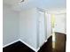Bright entryway with dark hardwood floors and neutral walls at 1960 Union St # 25, Clearwater, FL 33763