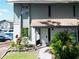 Two-story house with green exterior and landscaping at 1960 Union St # 25, Clearwater, FL 33763