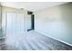Bedroom with neutral walls, carpet, and double door closet at 1960 Union St # 25, Clearwater, FL 33763