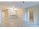 Open living room and dining area with tile flooring at 2333 Feather Sound Dr # B101, Clearwater, FL 33762