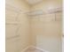 Spacious closet with wire and glass shelving at 2333 Feather Sound Dr # B101, Clearwater, FL 33762