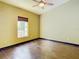 Spacious bedroom with large window and tile floors at 364 Terrace Rd, Tarpon Springs, FL 34689