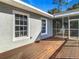 Wooden deck with adjacent screened porch at 364 Terrace Rd, Tarpon Springs, FL 34689