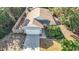 Aerial view of house, driveway, and yard at 364 Terrace Rd, Tarpon Springs, FL 34689