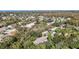 Aerial view showcasing a house's serene setting within a residential neighborhood at 364 Terrace Rd, Tarpon Springs, FL 34689