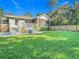 Charming home with a spacious backyard, perfect for outdoor entertaining at 364 Terrace Rd, Tarpon Springs, FL 34689