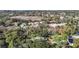 Aerial view of a house in a quiet neighborhood near the water at 364 Terrace Rd, Tarpon Springs, FL 34689