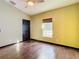 Well-lit bedroom featuring tile floors and a window at 364 Terrace Rd, Tarpon Springs, FL 34689
