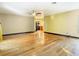 Bright living room with hardwood floors, fireplace, and sliding glass doors at 364 Terrace Rd, Tarpon Springs, FL 34689