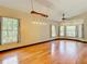 Sunlit living room showcasing hardwood floors and a tranquil ambiance at 364 Terrace Rd, Tarpon Springs, FL 34689