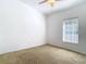 Simple bedroom with carpeted floors and a window at 364 Terrace Rd, Tarpon Springs, FL 34689