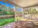 Relaxing screened porch overlooking the backyard at 364 Terrace Rd, Tarpon Springs, FL 34689