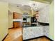 Modern kitchen with granite countertops and custom cabinetry at 364 Terrace Rd, Tarpon Springs, FL 34689