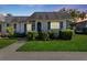 Quaint condo with a well-maintained lawn and walkway at 4220 Sheldon Pl # 4220, New Port Richey, FL 34652