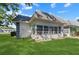 One story house with large sunroom and well manicured lawn at 4220 Sheldon Pl # 4220, New Port Richey, FL 34652