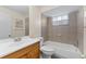 Clean bathroom with a bathtub, toilet and vanity at 4220 Sheldon Pl # 4220, New Port Richey, FL 34652