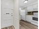 Kitchen is partially visible from the entryway at 4220 Sheldon Pl # 4220, New Port Richey, FL 34652