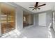 Enclosed porch with sliding glass doors and a view of the backyard at 4220 Sheldon Pl # 4220, New Port Richey, FL 34652