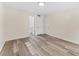 Simple bedroom with vinyl flooring and neutral wall colors at 4220 Sheldon Pl # 4220, New Port Richey, FL 34652